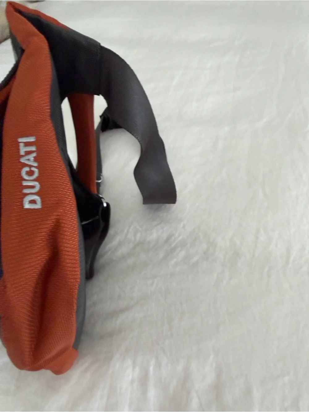TUMI Ducati Crossbody messenger bag. Discreet corporate logo on back. Never used